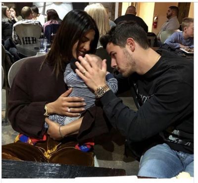 Priyanka Chopra and  Nick Jonas adorable click  with a baby goes viral..check here