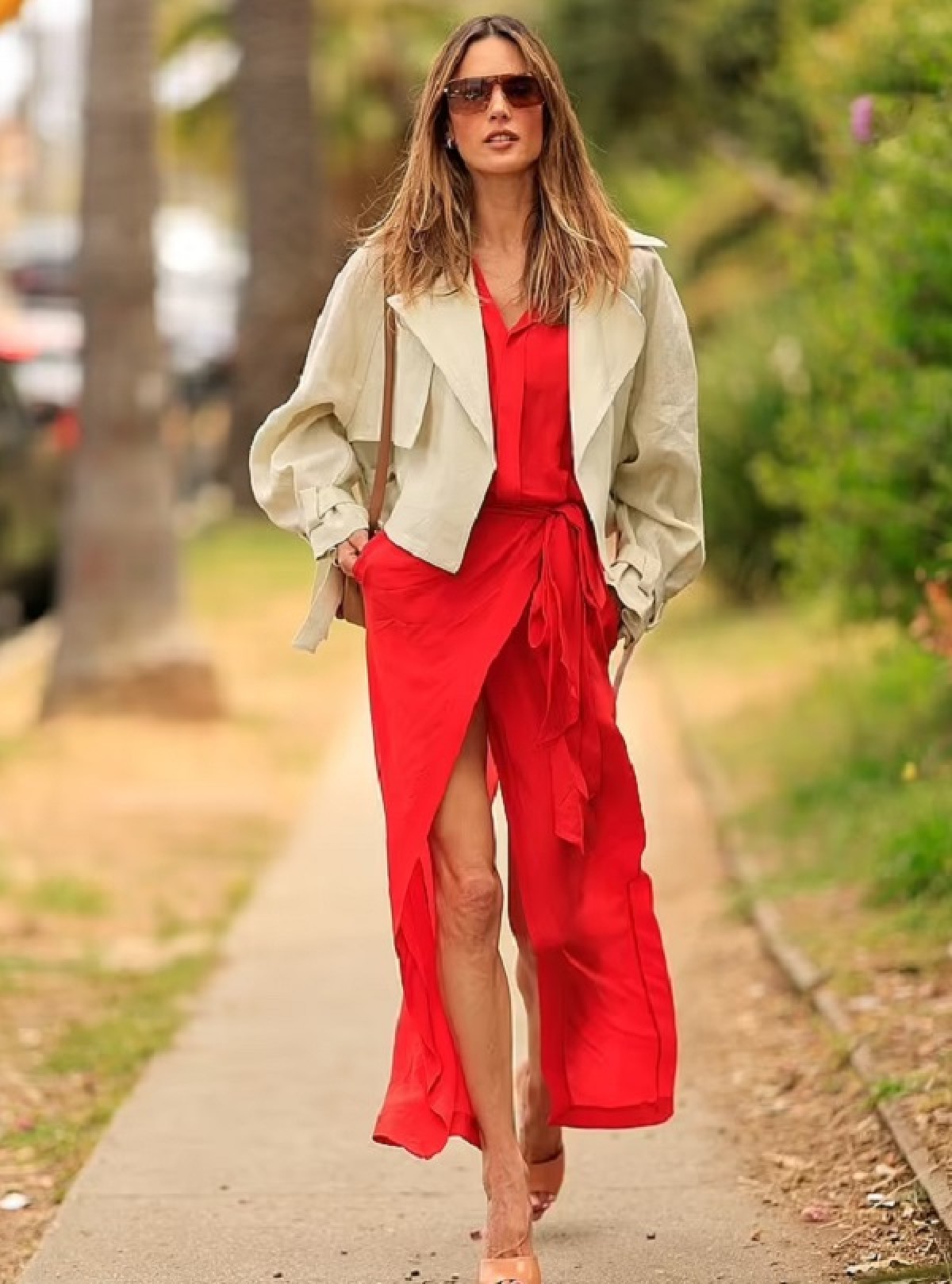 Alessandra Ambrosio was spotted on the streets of Los Angeles, the actress looked very stylish in a thigh slit red dress