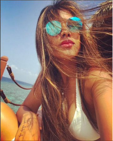 Nia Sharma is raising the temperature of Maldives high with her hot looks