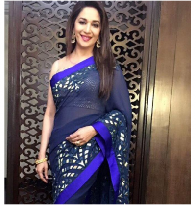 Madhuri Dixit looks classy in a royal blue saree