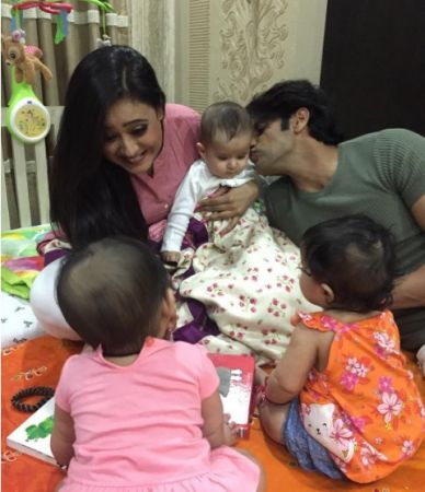 Tele-town girls clicking pictures with Karanvir Bohra's twin babies