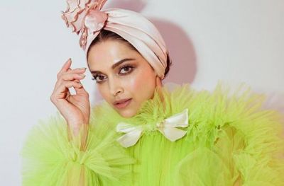 Deepika Takes a neon lime look at Cannes 2019