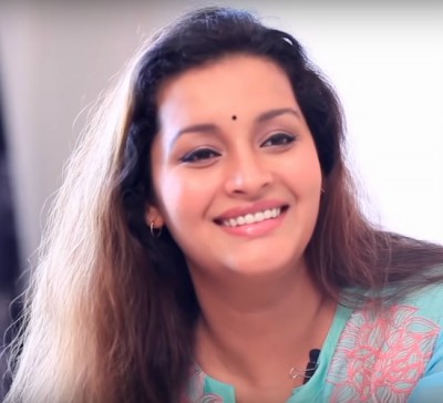 What compelled Renu Desai to sell her two cars?