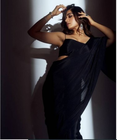 Rashmika Mandanna looks stunning in a black chiffon saree; photos
