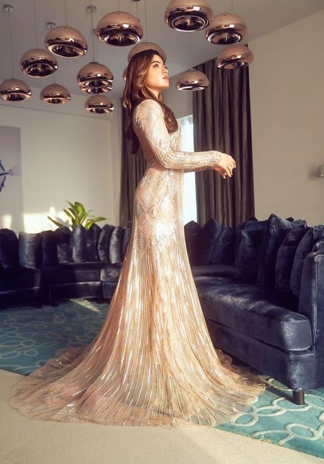 Rashmika Mandanna looks stunning in a golden sequin gown; PICS