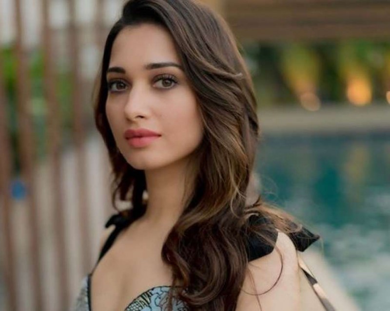 Tamannaah slays in tee and shorts as she poses for paparazzi!