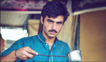 Your can't stop yourself falling for this handsome blue-eyed Pakistani 'chaiwala'
