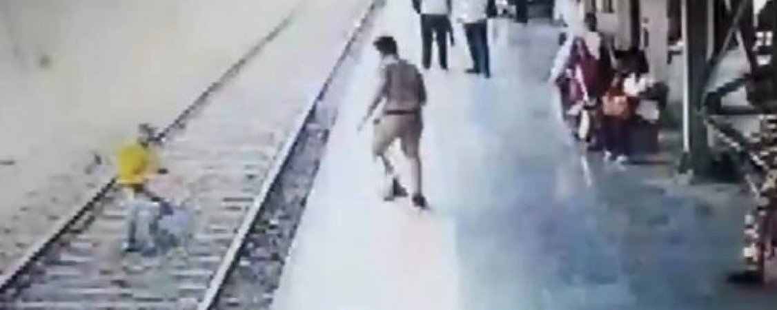 Video: Man jumps in front of train, policeman saves his life