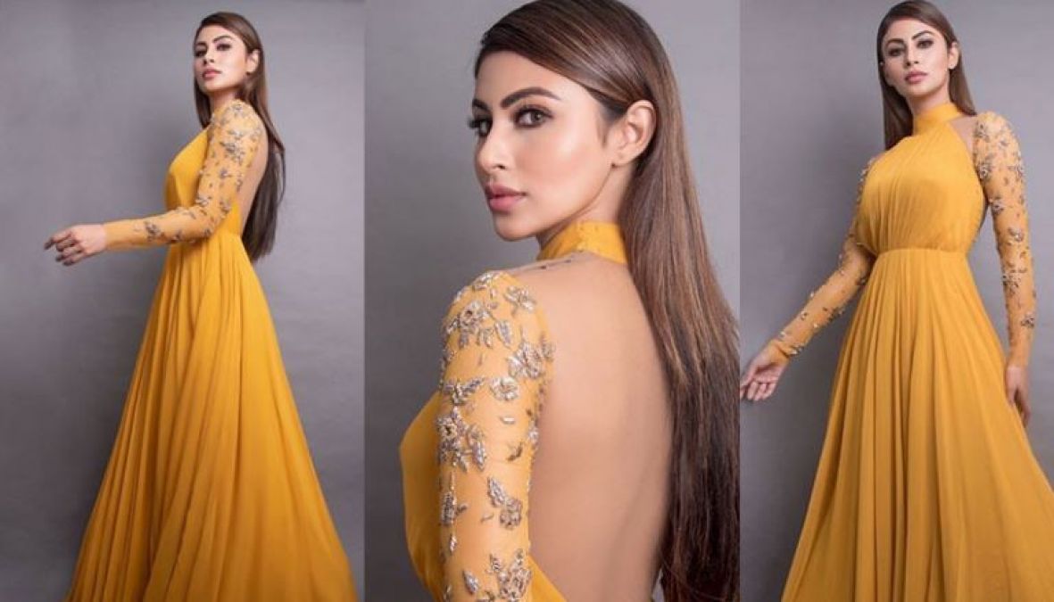 Mouni's halter neck gown is very attractive for high-class parties!