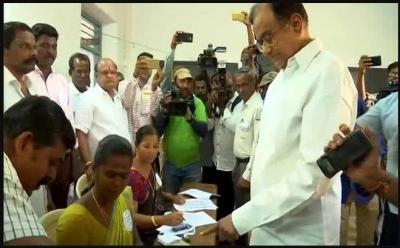 Former FM P Chidambaram cast vote with his family among first voters