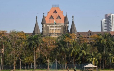 Touching cheeks of minor without sexual intent not sexual assault: Bombay HC