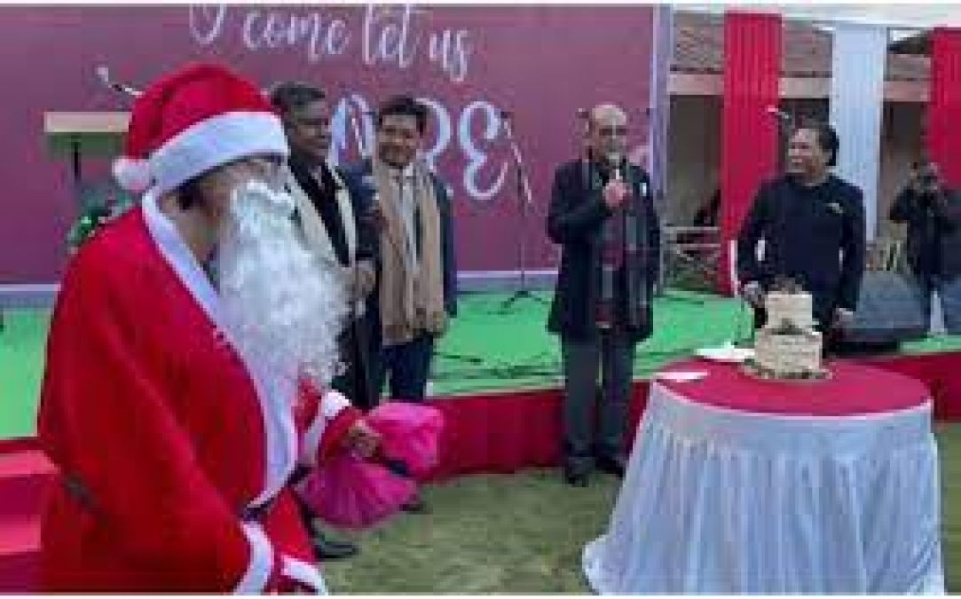 CM of Meghalaya, the leader of opposition, and the speaker share the stage to sing Christmas carols
