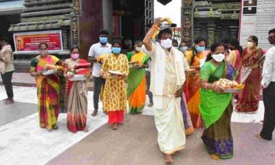 Devotees present Sare to Goddess Kanaka Durga