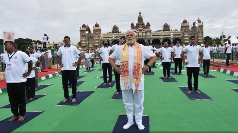 Yoga Day - Yoga brings peace to our universe:PM Modi