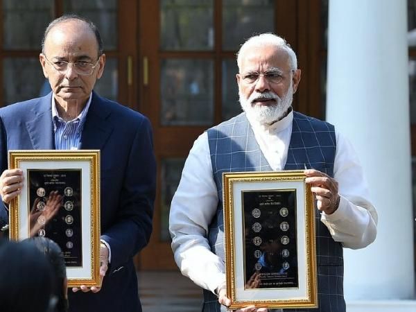 PM Modi unveils new series  Re 1, Rs 2, Rs 5, Rs 10, Rs 20 coins which are visually impaired friendly