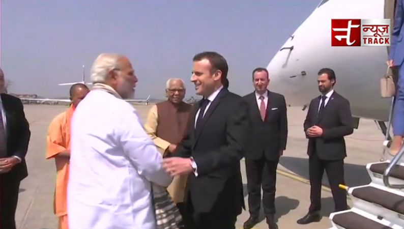 France President arrives at Varanasi, CM Yogi Adityanath extends warm welcome