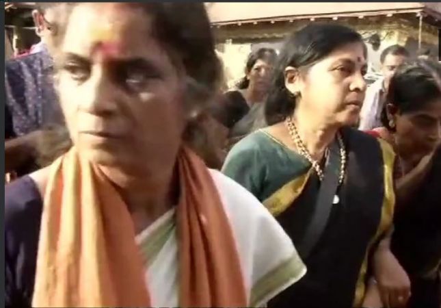 A 52-year-old woman devotee whose entry to Sabarimala temple opposed by protesters, offered prayers under police protection