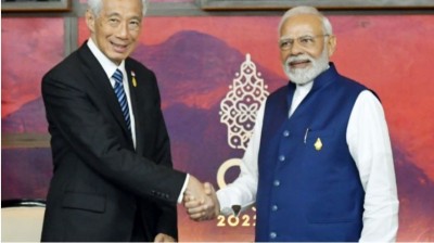 Modi meets Singapore, Italy PMs in Bali; invites them to India