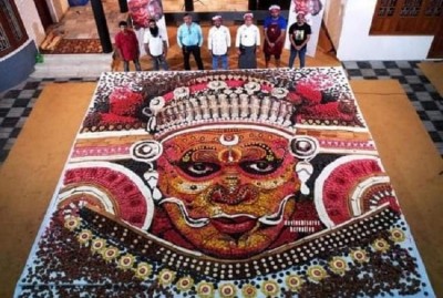 Kerala artist uses bakery goods to build a 24-foot-long Theyyams face.