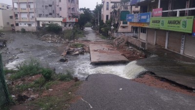 Water from Jilelaguda Lake on roads and residential area