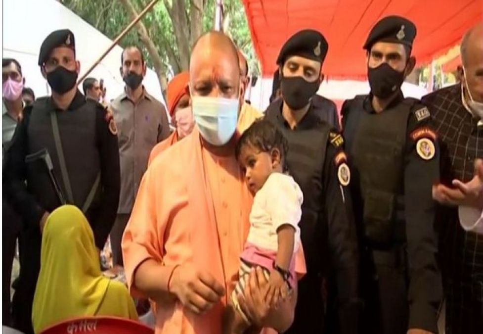 UP CM Adityanath meets flood victims at Siddharthnagar, distributes relief material