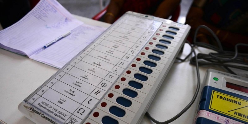 Four suspended after EVMs found in Assam BJP leaders car, EC orders repoll