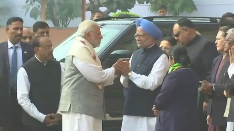 PM Modi, Manmohan Singh shake hands