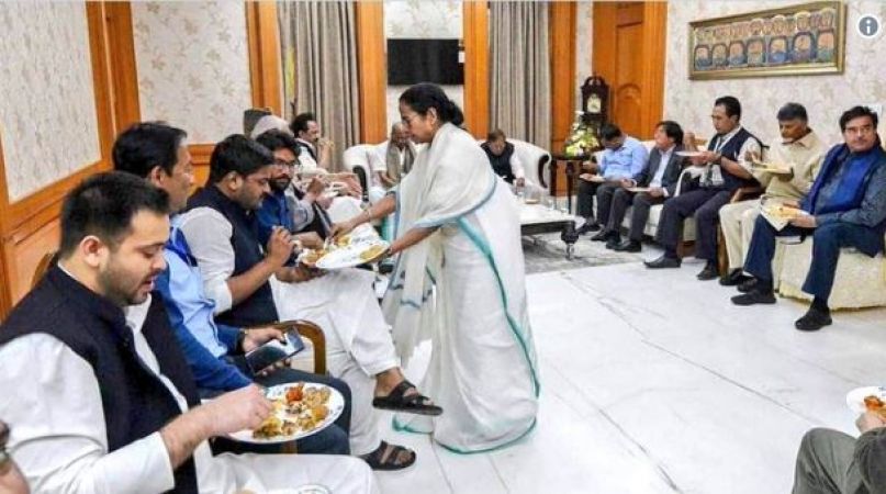 Photo of Mamata Banerjee serving  meals to regional party leaders goes viral on internet