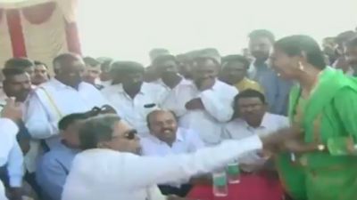 Former Karnataka CM Siddaramaiah pulls woman's dupatta during a public meeting