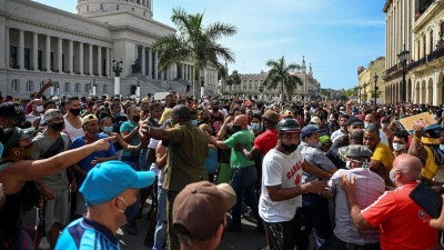 After historic protests, defiant Cubans face mass trials