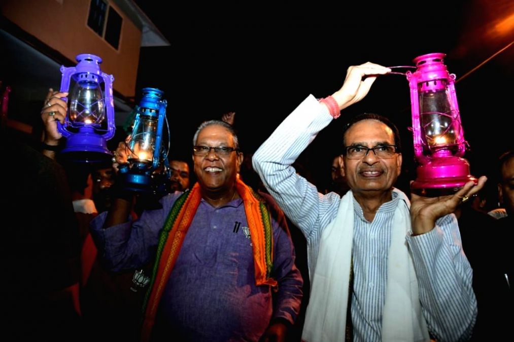 Former Madhya Pradesh CM Shivraj Singh Chouhan holds a lalten march