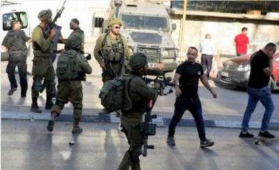 Israeli forces conduct raids and detain Palestinians