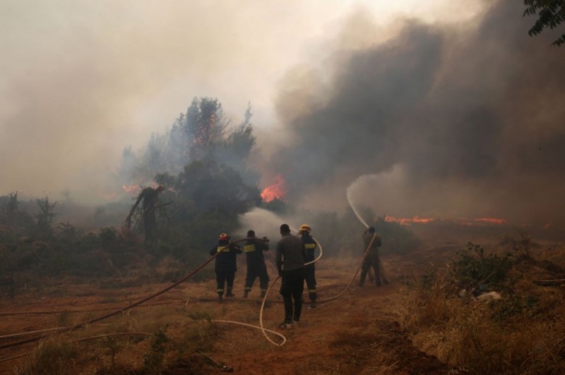 बारिश से मिल सकती है ग्रीस के जंगलों में लगी आग से राहत