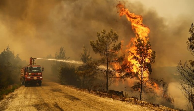Wildfires burn across Southern Europe rage as heat-wave hits