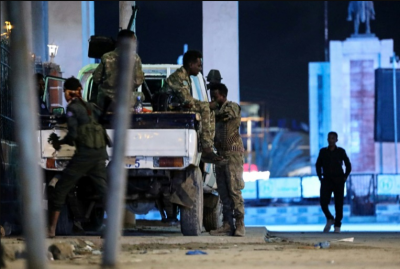 12 people are killed as Somali forces fight al-Shabab at a hotel under siege in Mogadishu