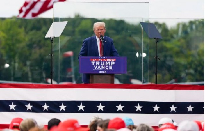 Trump Addresses Rally Behind Bulletproof Glass After Surviving Assassination Attempt