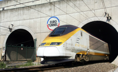 Eurotunnel passengers are forced to exit the train that is stuck beneath the English Channel