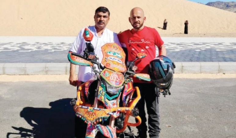 Pakistani adventurer decorates a bike with a truck to promote the nation's friendly image in the Middle East