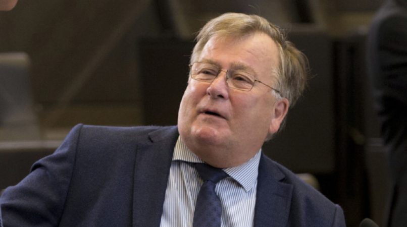 An ex-minister of denmark is accused of disclosing state secrets