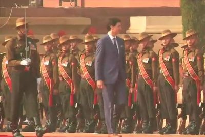 Canadian PM Trudeau inspects guard of honour at Rashtrapati Bhawan.