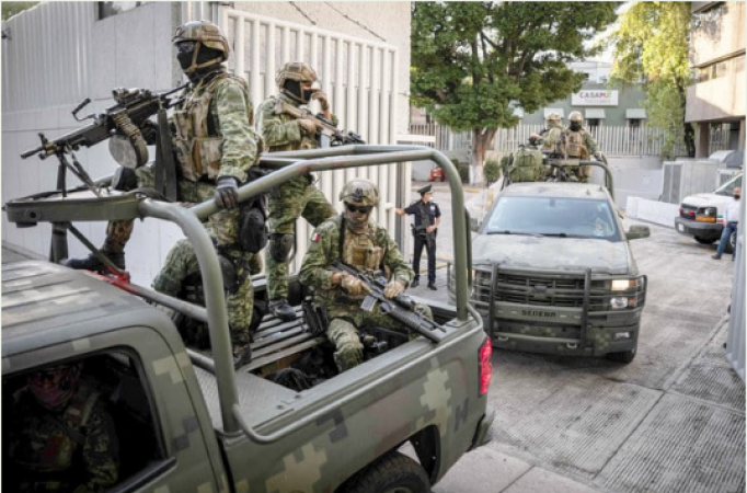 El Chapo's son is apprehended in Mexico, setting off a wave of violence