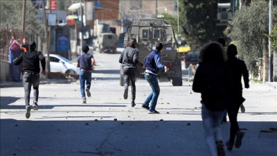 In West Bank clashes, dozens of Palestinians are injured