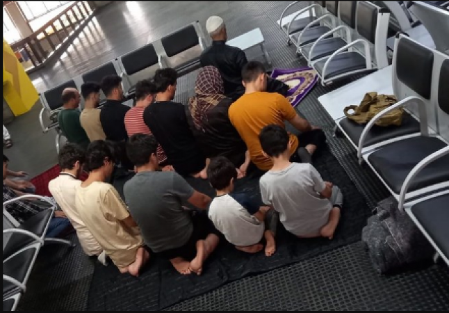 Sad Eid Al-Adha is spent by Afghan refugees in Brazil in a temporary airport camp