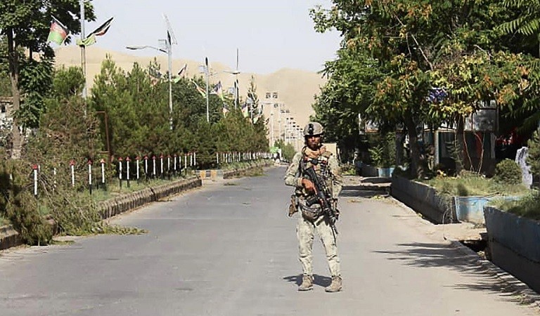 Taliban militants surround major Afghan cities, ready for a showdown