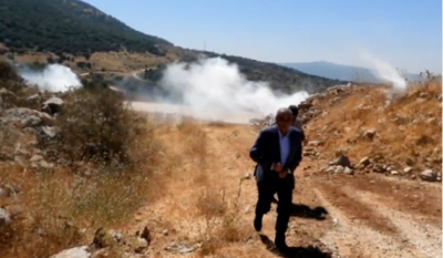 Israeli tear gas during border clashes hurts a Lebanese MP