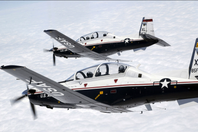 Four T-6C training aircraft are delivered by the US to Tunisia