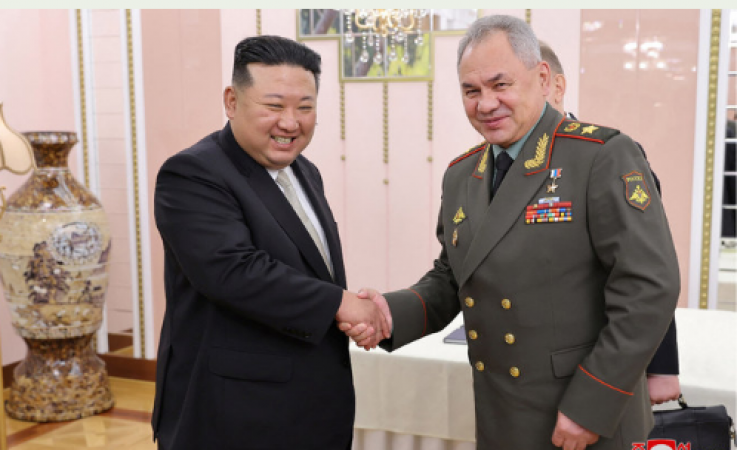 Kim takes the Russian defence minister on a tour of the arms show