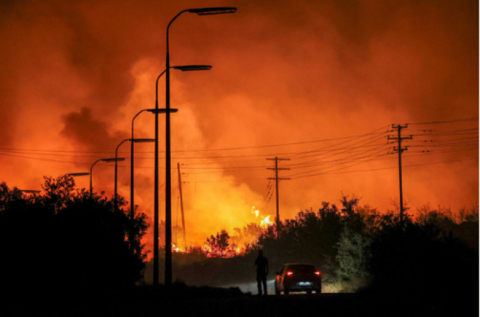 Firefighters in a Fierce Fight: Greece Confronts Raging Wildfires as Winds Escalate