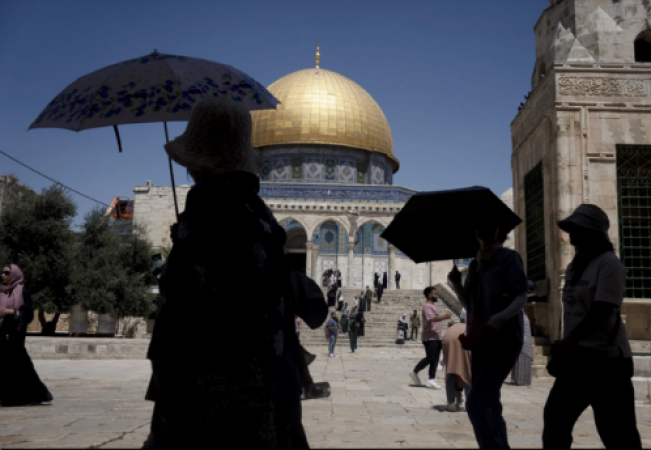 A 14-year-old Palestinian is killed by army fire as an Israeli minister visits a flashpoint mosque