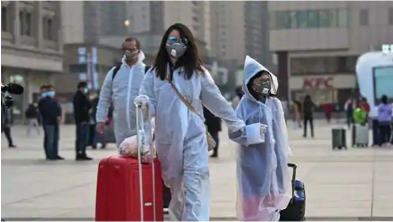 चीन के गुआंगझोउ में अधिकारियों ने निवासियों से कहा- कोरोना महामारी के बीच न छोड़े शहर